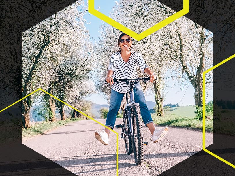 Woman riding her bike in the spring